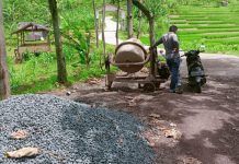 Keterlambatran Pengerjaan Jalan Beton Penghubung di Desa Suka Mulya Diduga ada unsur KKN