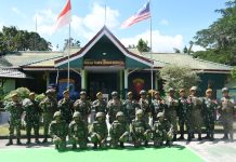 Menjaga Sinergitas di Perbatasan, Satgas Yonarmed 16/TK Terima Kunjungan Tentara Darat Malaysia
