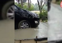 MOBIL DINAS MELINTAS JALAN YANG BARU SAJA DICOR DI LUBUKLINGGAU